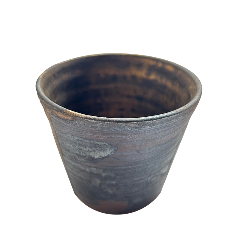 A hand-thrown extra-large soba dipping cup in iron gray with a soft gold wash, viewed from an angled top perspective to highlight its shape and handcrafted texture.