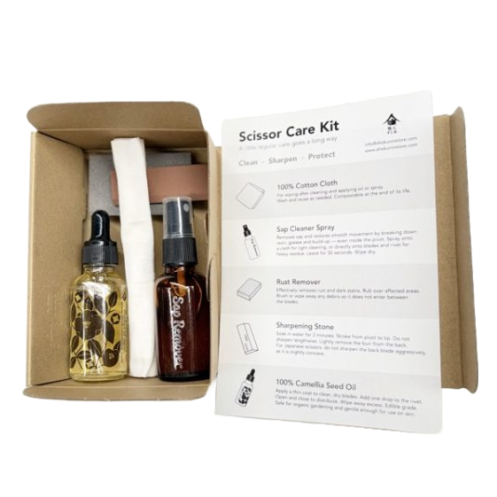 Inside Box containing 5 items of Japanese Garden Scissor Care Kit is Shokunin Store original sap cleaner, rust and sap remover, sharpening stone 1000 grit, 100% camellia tool oil, cotton cloth and instruction.