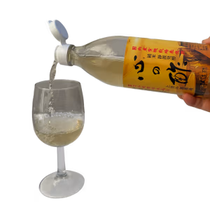 Kokoro Organic Japanese Vinegar Raw and Unfiltered poured into a wine glass