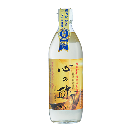 A bottle of Kokoro Japanese Organic Rice Vinegar 500ml, award-winning raw and unfiltered rice vinegar from Japan, naturally fermented and aged for over 13 months.